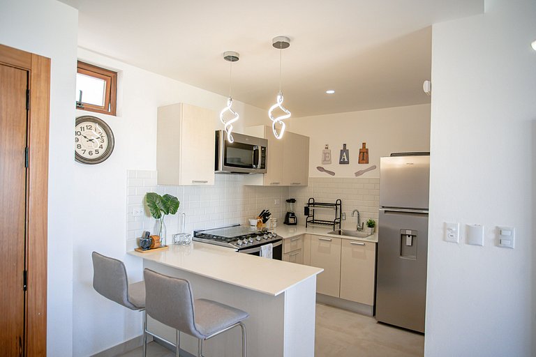 Apartamento frente a la piscina dos habitaciones