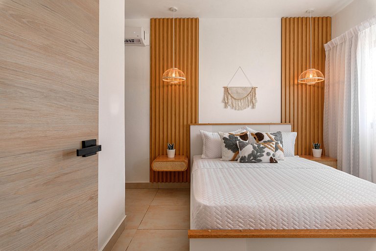Apartamento con piscina, gym y playa a 7 minutos