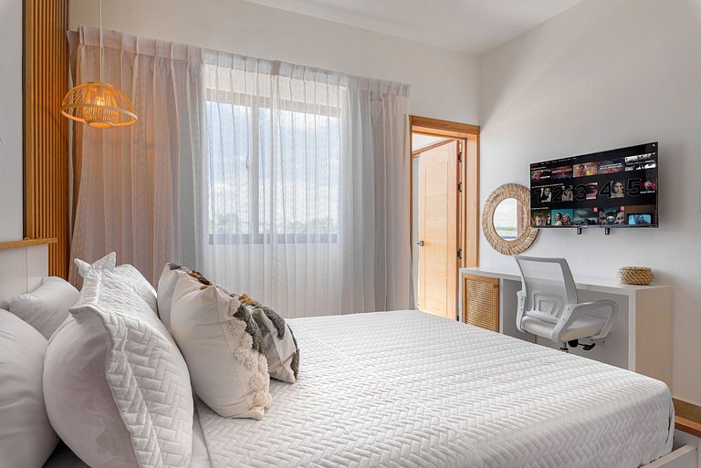 Apartamento con piscina, gym y playa a 7 minutos