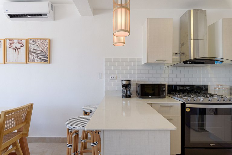 Apartamento con piscina, gym y playa a 7 minutos