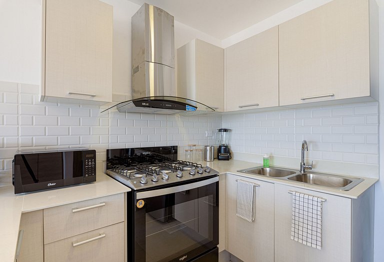 Apartamento con piscina, gym y playa a 7 minutos