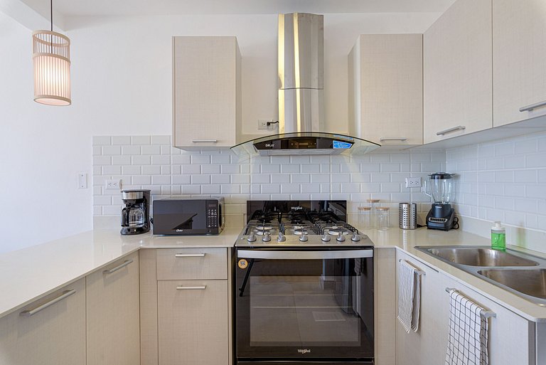 Apartamento con piscina, gym y playa a 7 minutos