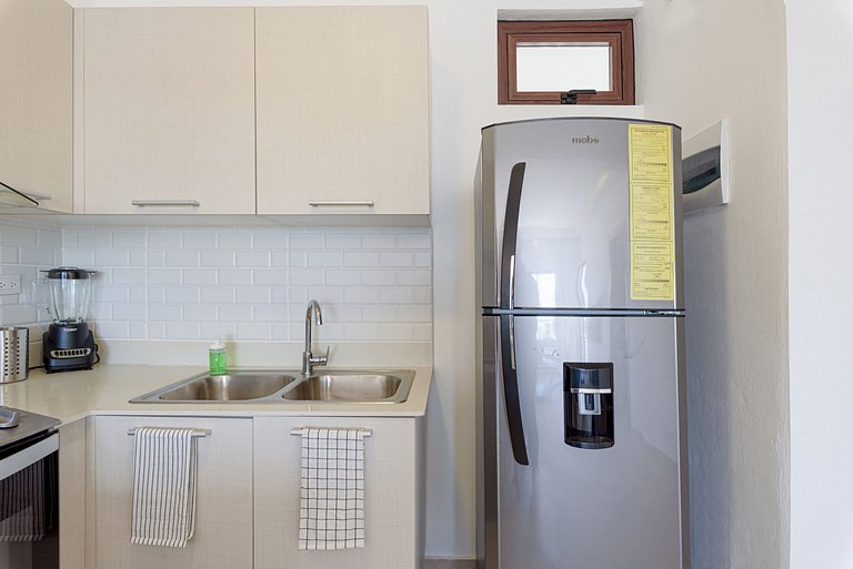 Apartamento con piscina, gym y playa a 7 minutos