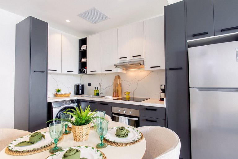 Apartamento 1BR piscina, golf y playa artificial