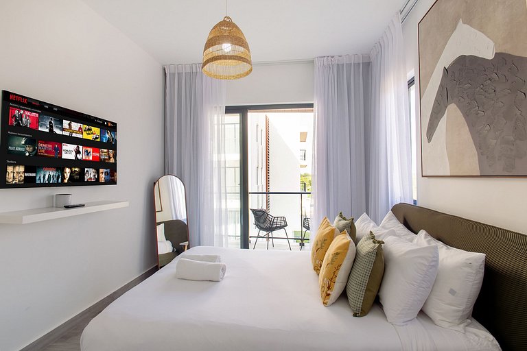 Apartamento 1BR piscina, golf y playa artificial