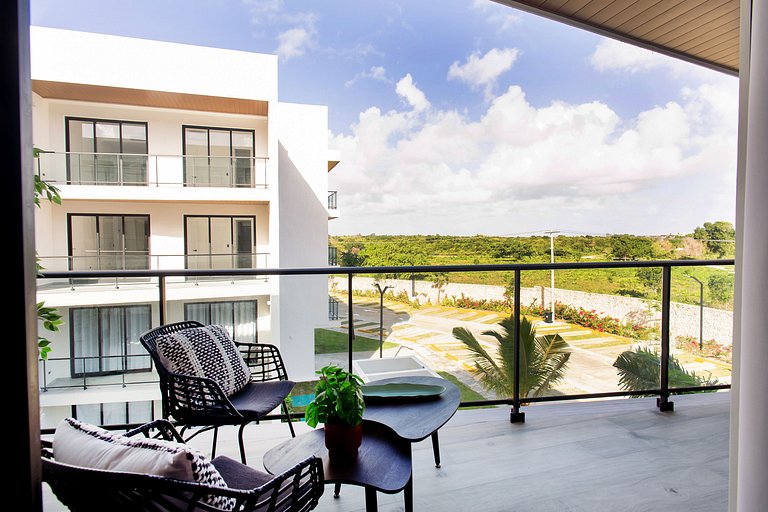 Apartamento 1BR piscina, golf y playa artificial