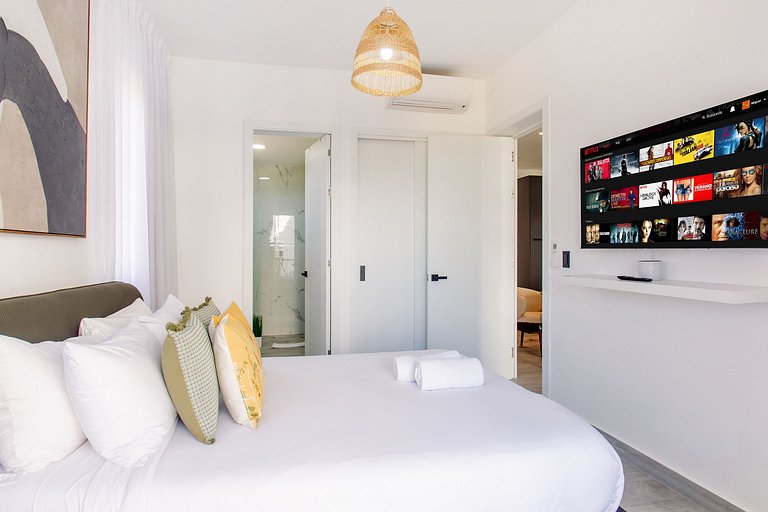 Apartamento 1BR piscina, golf y playa artificial