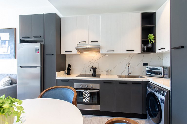 Exclusivo 1BR piscina, gym y playa artificial