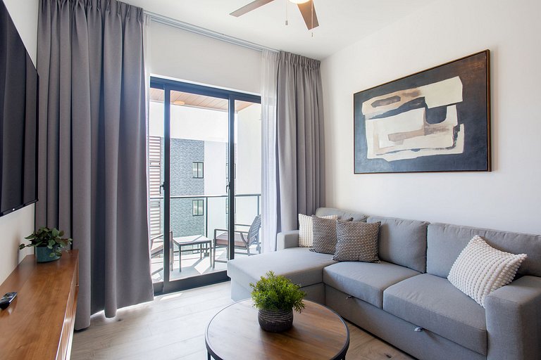 Exclusivo 1BR piscina, gym y playa artificial