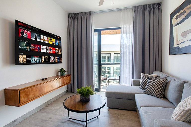 Exclusivo 1BR piscina, gym y playa artificial