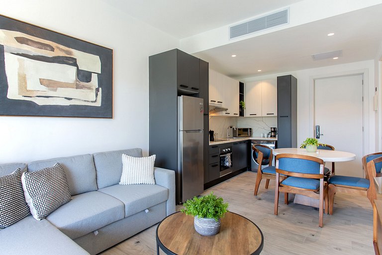 Exclusivo 1BR piscina, gym y playa artificial