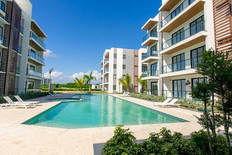 Exclusivo 1BR piscina, gym y playa artificial