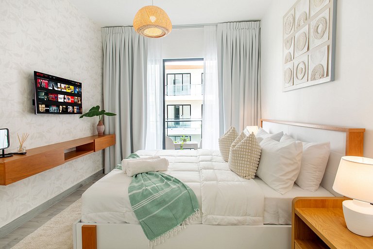 1BR, exclusivo, piscinas, gym y playa artificial