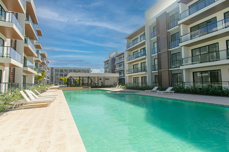 1BR, exclusivo, piscinas, gym y playa artificial