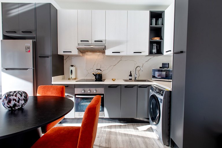 1BR primer nivel, piscina, gym y playa artificial