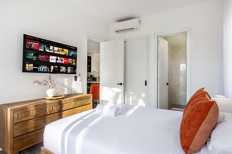 1BR primer nivel, piscina, gym y playa artificial