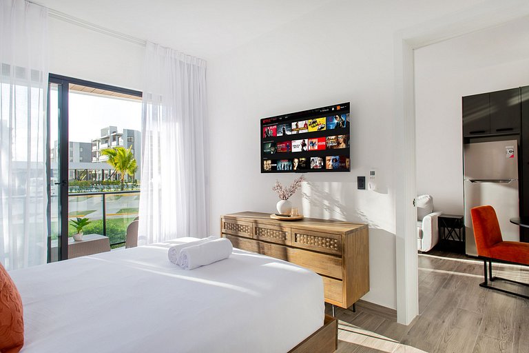 1BR primer nivel, piscina, gym y playa artificial