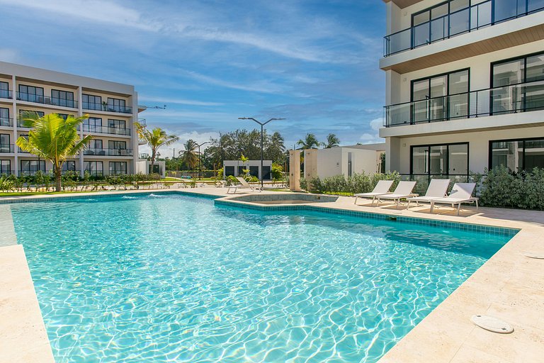 1BR primer nivel, piscina, gym y playa artificial