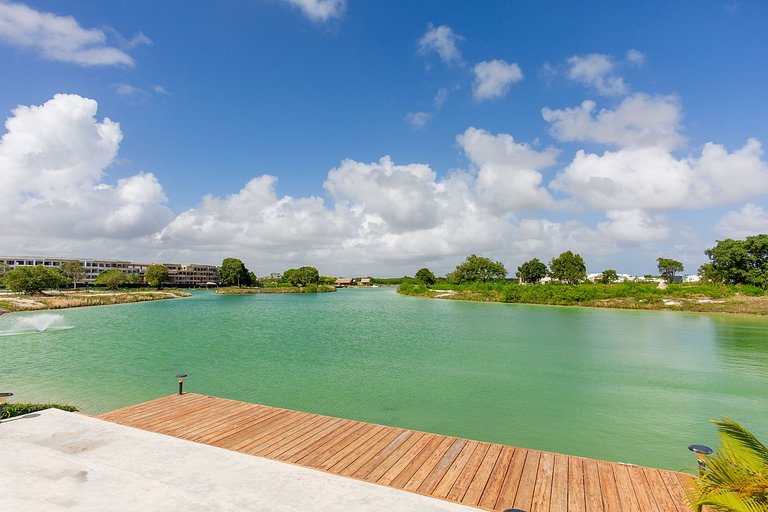 1BR primer nivel, piscina, gym y playa artificial