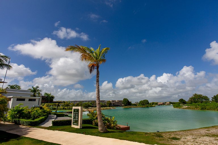 1BR primer nivel, piscina, gym y playa artificial