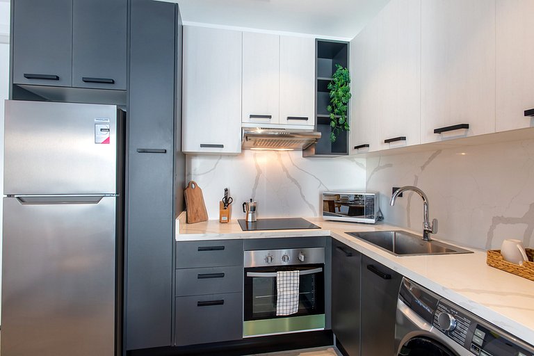 Vista a la Piscina, Gimnasio y Playa Artificial