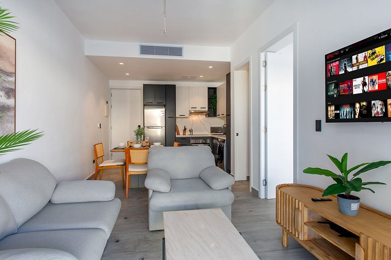 Vista a la Piscina, Gimnasio y Playa Artificial