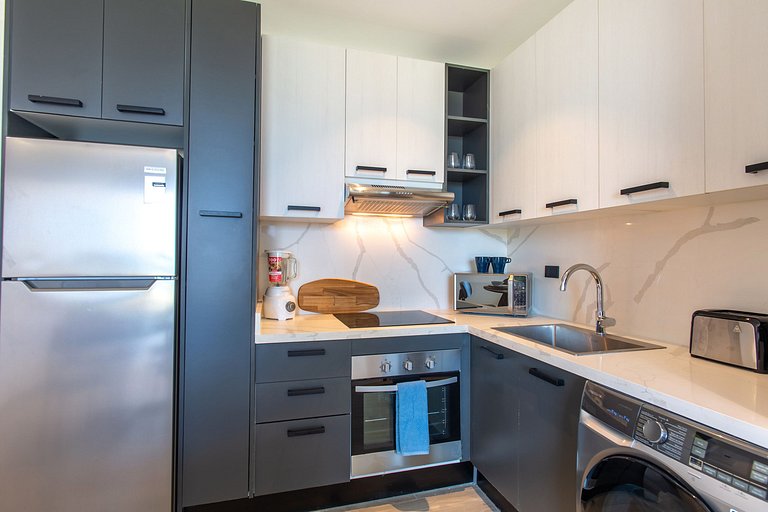 1BR, playa artificial, piscinas, gym, ubicación