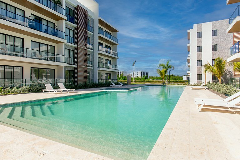 1BR, playa artificial, piscinas, gym, ubicación