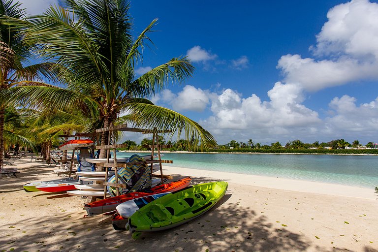 1BR, playa artificial, piscinas, gym, ubicación
