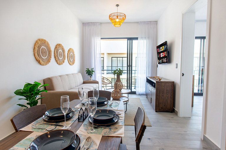 1BR moderno, piscinas, gimnasio y playa artificial