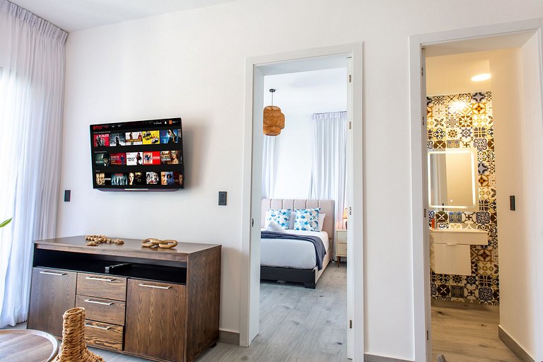 1BR moderno, piscinas, gimnasio y playa artificial