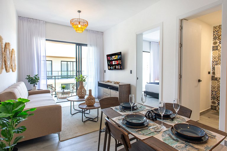 1BR moderno, piscinas, gimnasio y playa artificial