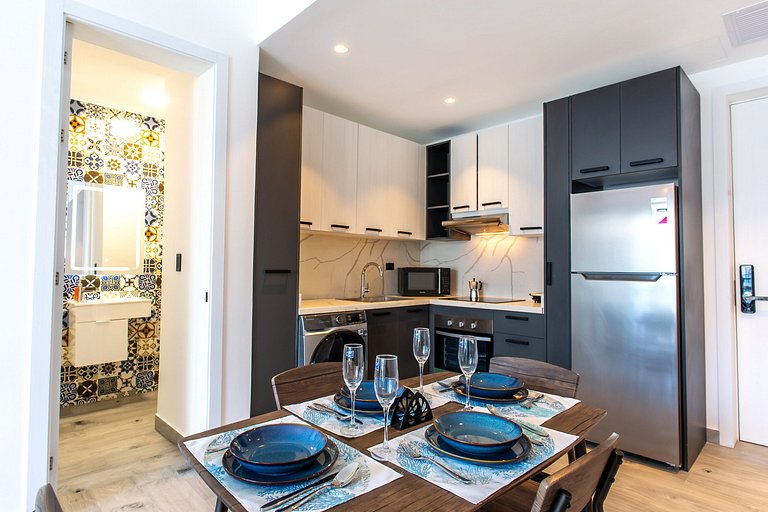 1BR moderno, piscinas, gimnasio y playa artificial