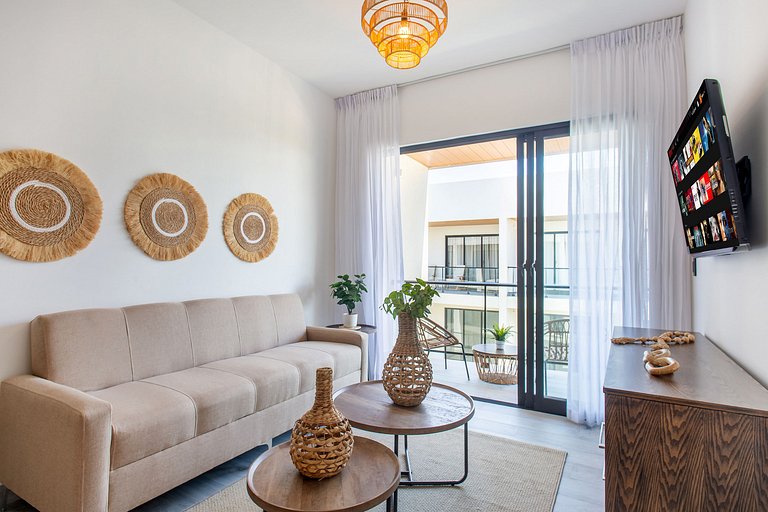 1BR moderno, piscinas, gimnasio y playa artificial