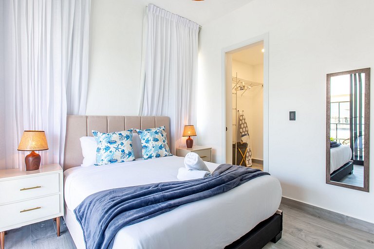 1BR moderno, piscinas, gimnasio y playa artificial