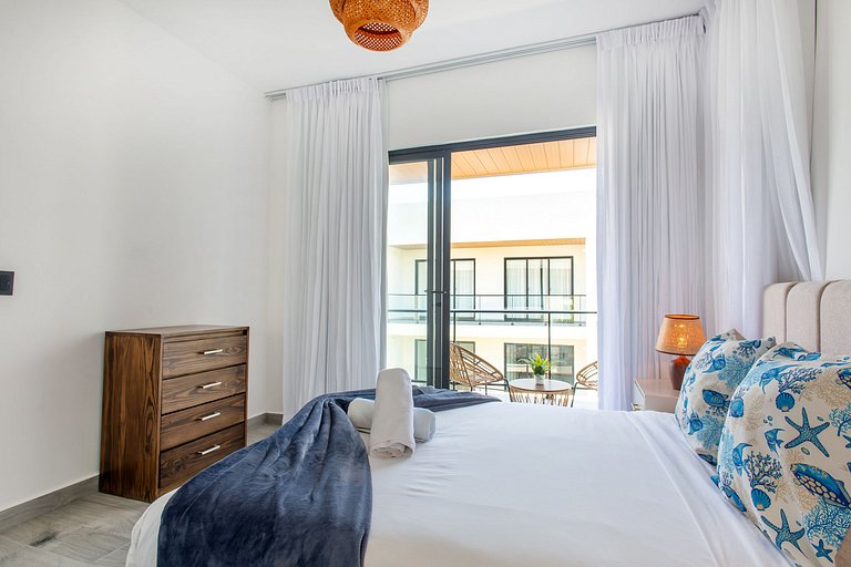 1BR moderno, piscinas, gimnasio y playa artificial