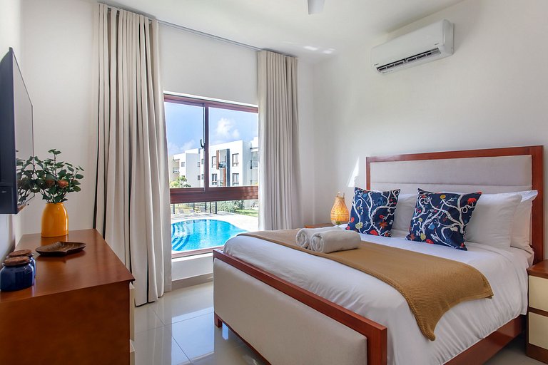 2 habitaciones con vista a piscina y jardín
