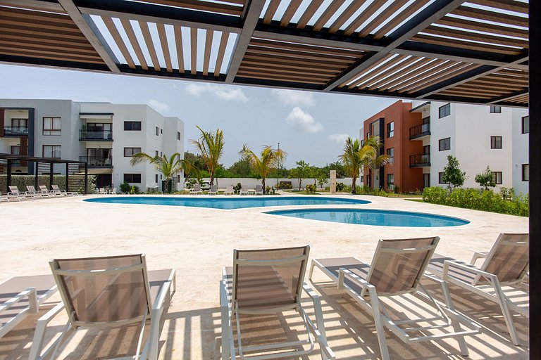 Apartamento de dos Habitaciones piscina y gimnasio