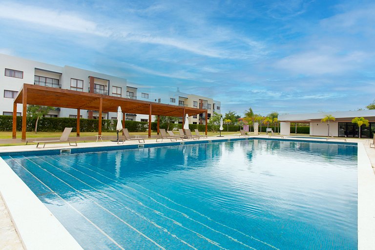 Apartamento vista a piscina, gym y cerca de playa