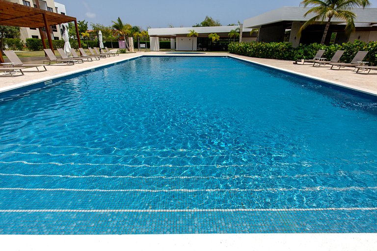 Apartamento vista a piscina, gym y cerca de playa