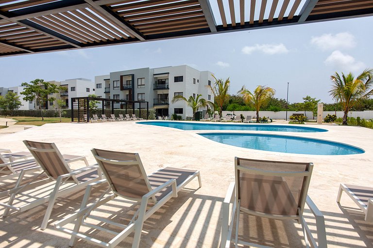 Apartamento vista a piscina, gym y cerca de playa